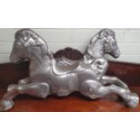 Two Horse Wall Mounts. Possibly both sides of a carousel horse.