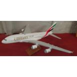 A large Emirates Airbus A 380 desktop Model.