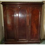 A Victorian Mahogany three door Wardrobe W197 x H210 cms.