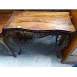 A 19th Century Rosewood fold over Card Table on cabriole supports.