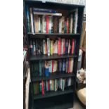A very large quantity of Books in an open bookcase.