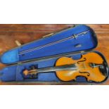 A good 19th Century full size one piece back Violin with bow in timber case.