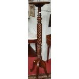 A 19th Century Mahogany Torchere Stand.