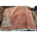 A large Pink ground Rug. Approx 340 x 240 cms.