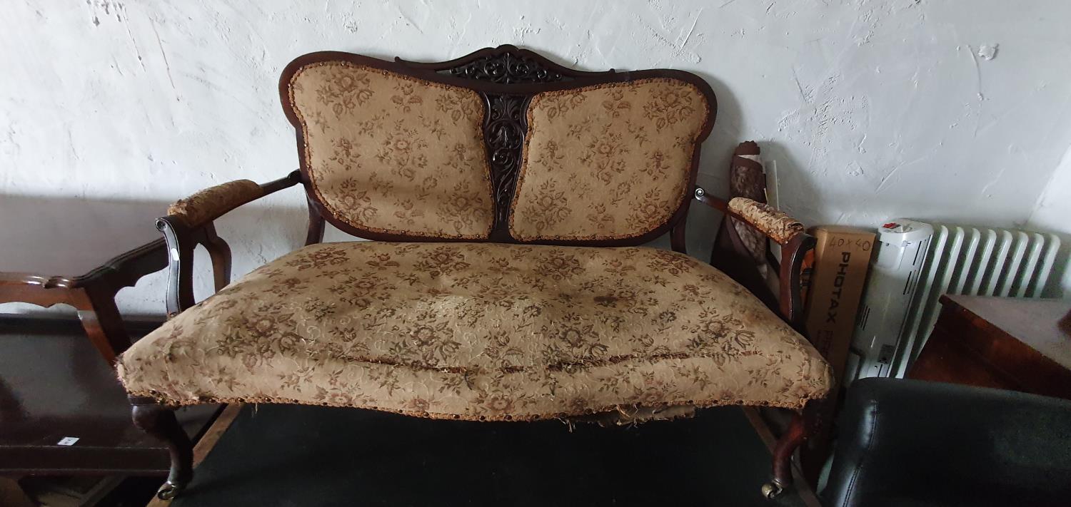 A late 19th Century Mahogany Side Table along with an Edwardian pierced panel two seater couch and a