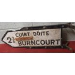 A Vintage Cast Iron Figure Board Road Sign 'Cuirt Doite 2 3/4 Burncourt'.