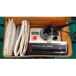 A good cased Polaroid 1000 land Camera with instructions.