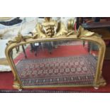 A 19th Century Timber Gilt Overmantle Mirror with original gilt. 110cms wide x 81 cms high.