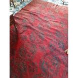 A large Burgundy Ground Rug with all over decoration. 320 x 226cm and one other.