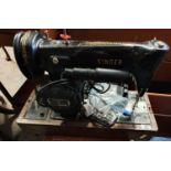 Two Vintage Singer Sewing Machines. One cased.
