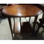 An Edwardian Mahogany and Inlaid Oval Side Table. 56 L x 40 D x 70 H cm.