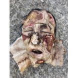 A prop head of a dead Man.