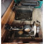 A Vintage Typewriter and Sewing Machine.