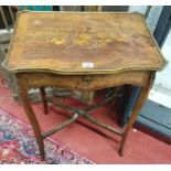 A late 19th Century rosewood and inlaid Work Table with brass mounts.51w x 36 x 72h cms.