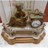 A 19th Century French Ormolu Mantle Clock on stand.51w x 38h cms.