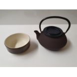 A quantity of Pottery teapots and other Items. As new.
