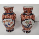 A lovely pair of Imari style vases.18h cms.