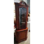 A really nice mahogany style Corner Cabinet.