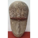 A wall mounted Stone style Head.