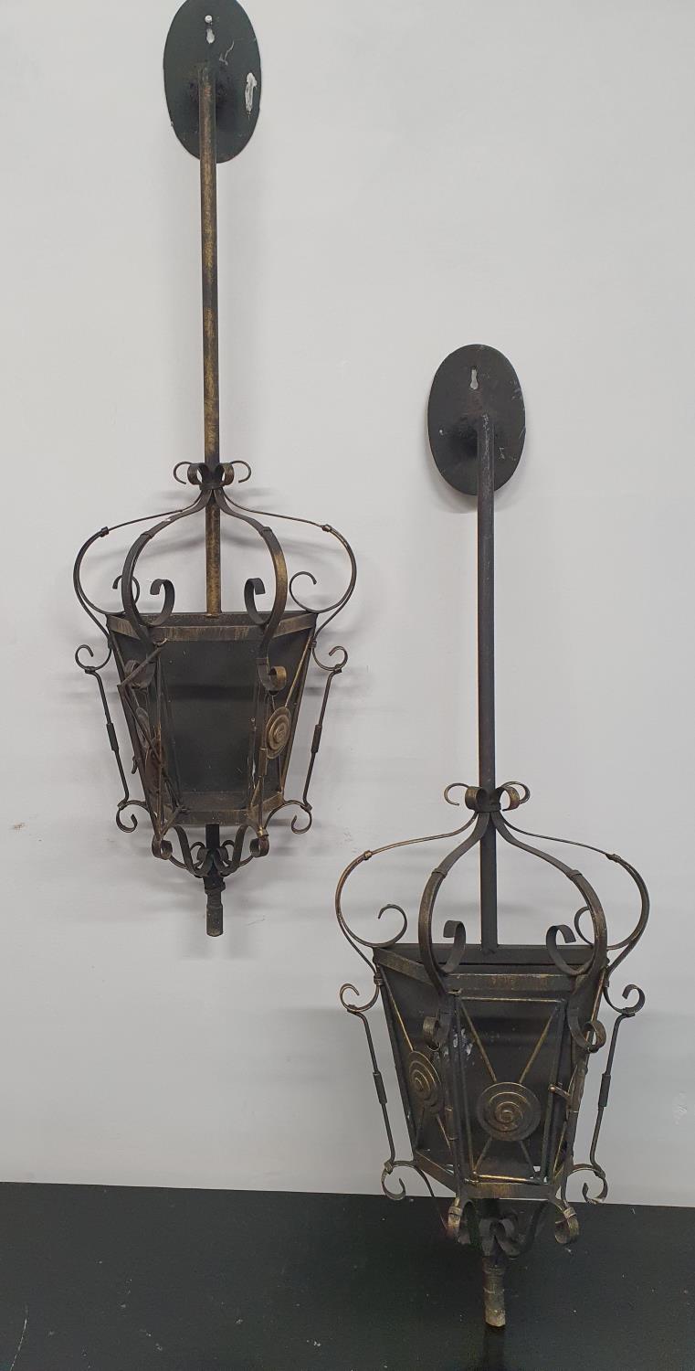 A pair of Metal wall mounted Hanging Lights. (flat back).110h cms.