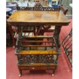 A 19th Century Walnut Canterbury Whatnot along with a late 19th Century Walnut inlaid Armchair.