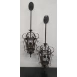 A pair of Metal wall mounted Hanging Lantern.110h cms.