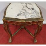 A Timber and Gilt Table with a Marble top.47w x 43 x 51h cms.