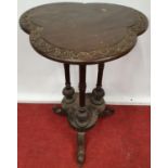 A carved Timber Mahogany Table.50w x 75h cms.