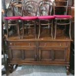 An early 20th Century Oak Sideboard, four bentwood chairs and a singer sewing machine.