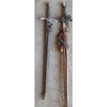 A group of nine prop swords and Scabbards.