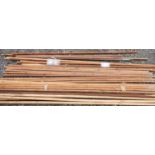 A large quantity of timber Poles used as Fighting poles, Banner poles etc.