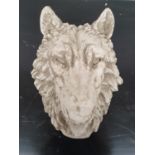 A really well cast moulded head of a Wolf.36w x 43h cms.