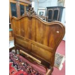 A 19th Century walnut Bed with carved & molded head and foot board.