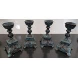 SILK ROAD: Four Metal Candlesticks.26h cms.