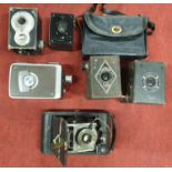 A quantity of Vintage Cameras to include a Kodak Brownie, BMM Movie Camera, Ensign E20, A Warwick