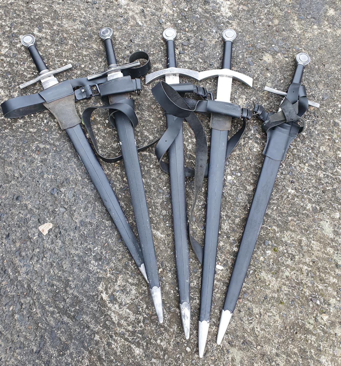 A really good group of five Steel bladed Swords and Scabbards. (black leather).