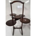 A good Edwardian Mahogany Cake Stand with unusual mechanism.74h cms.