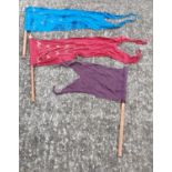 A good quantity of handheld Flags used in a famous award winning show.