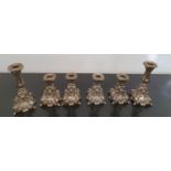 PARIS CATHEDRAL: A group of Metal Candlesticks.12h and 18h cms.