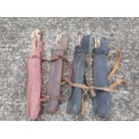 A group of four Leather Quivers each with Arrows.