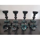 SILK ROAD: Four Metal Candlesticks.26h cms.