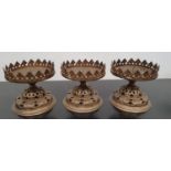 SILK ROAD: Three Brass Prickett Candlesticks.16d x 14h cms.