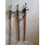 A group of three Prop Swords and Scabbards.