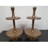 A pair of Timber style metal Circular Stands.66h cms.