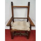 A 19th Century Timber Armchair.67w x seat h 50 cms.
