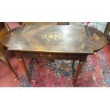 A good rosewood and inlaid drop leaf table with brass edging.114w x 52 x 74h cms.