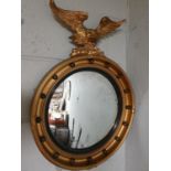 A good Eagle surmounted Mirror.45w x 60h cms.