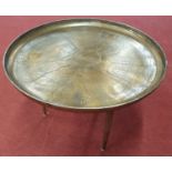 PRINCE OLEG THRONE ROOM-NOVAGROD: A Circular Brass Table.66d x 46h cms.