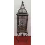 BACKTLOT: A heavy duty Metal Bird Cage on stand.40w x40d x 165h cms.