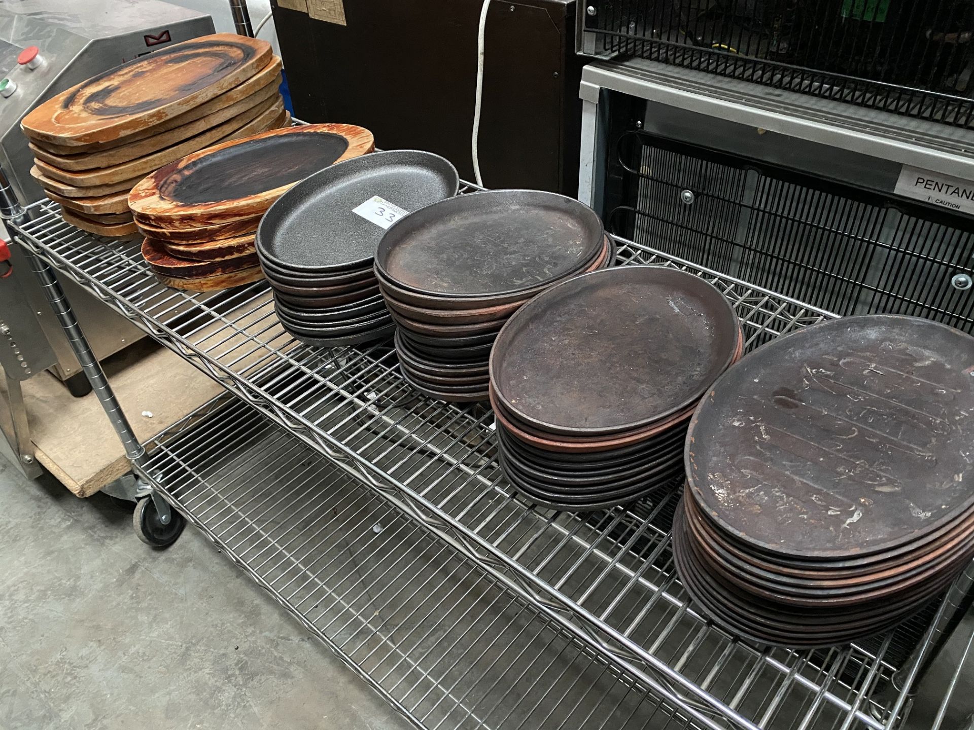 45 x Sizzler Pans and 14 Wooden Bases